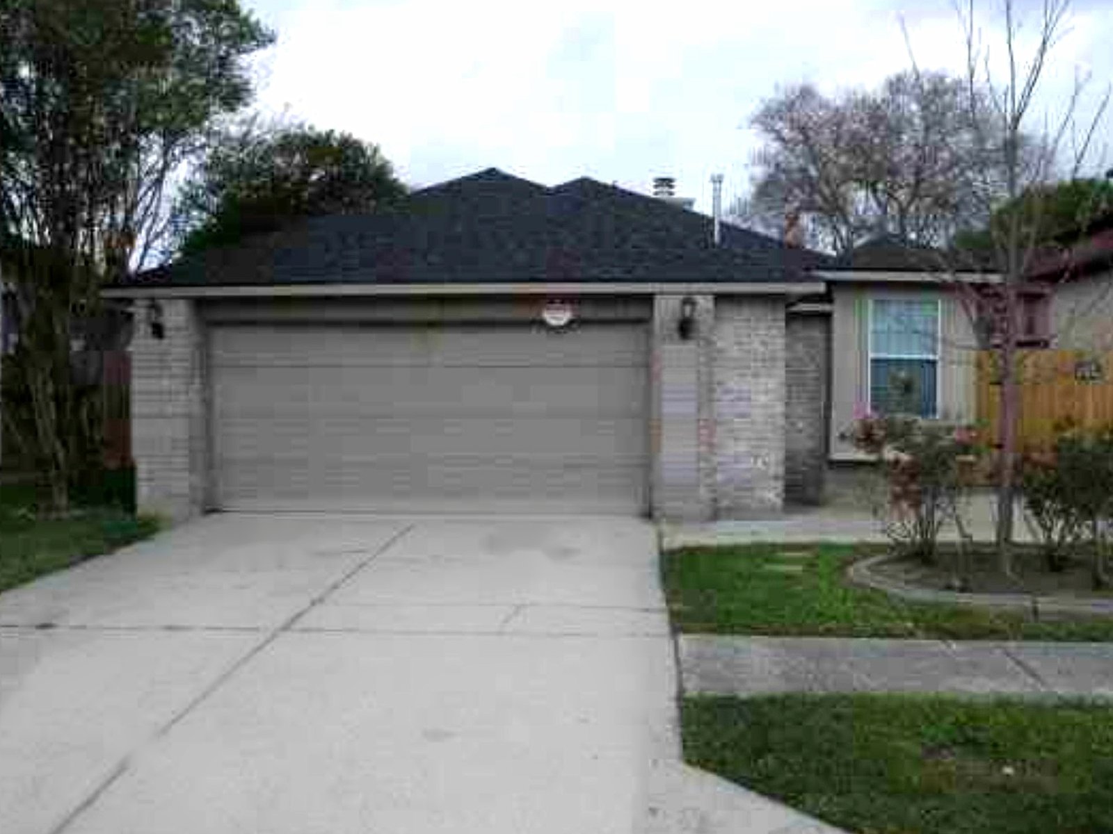 Front elevation of the Cold Lake Drive residence in Houston, Texas, rebuilt and leased by REPCA