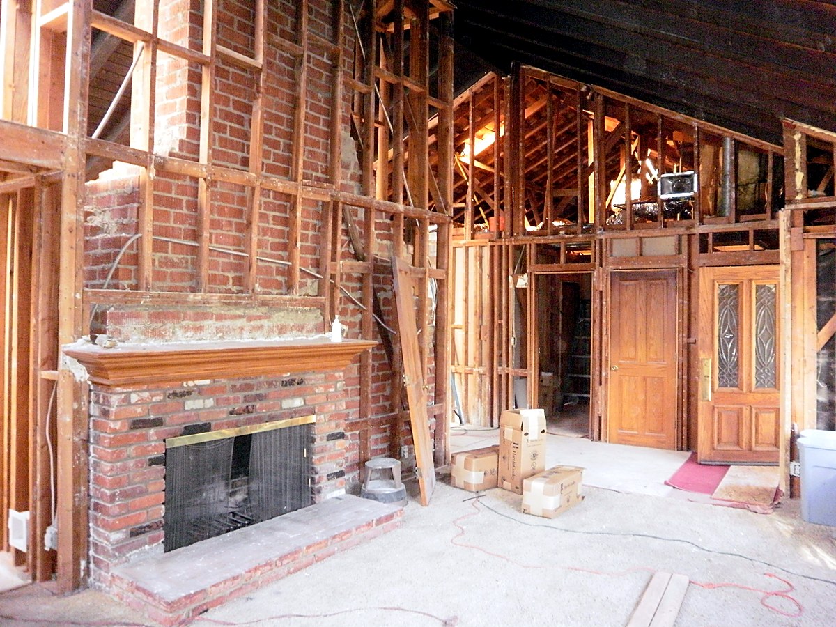 Living room and fireplace taken back to the framing at Natoma Avenue